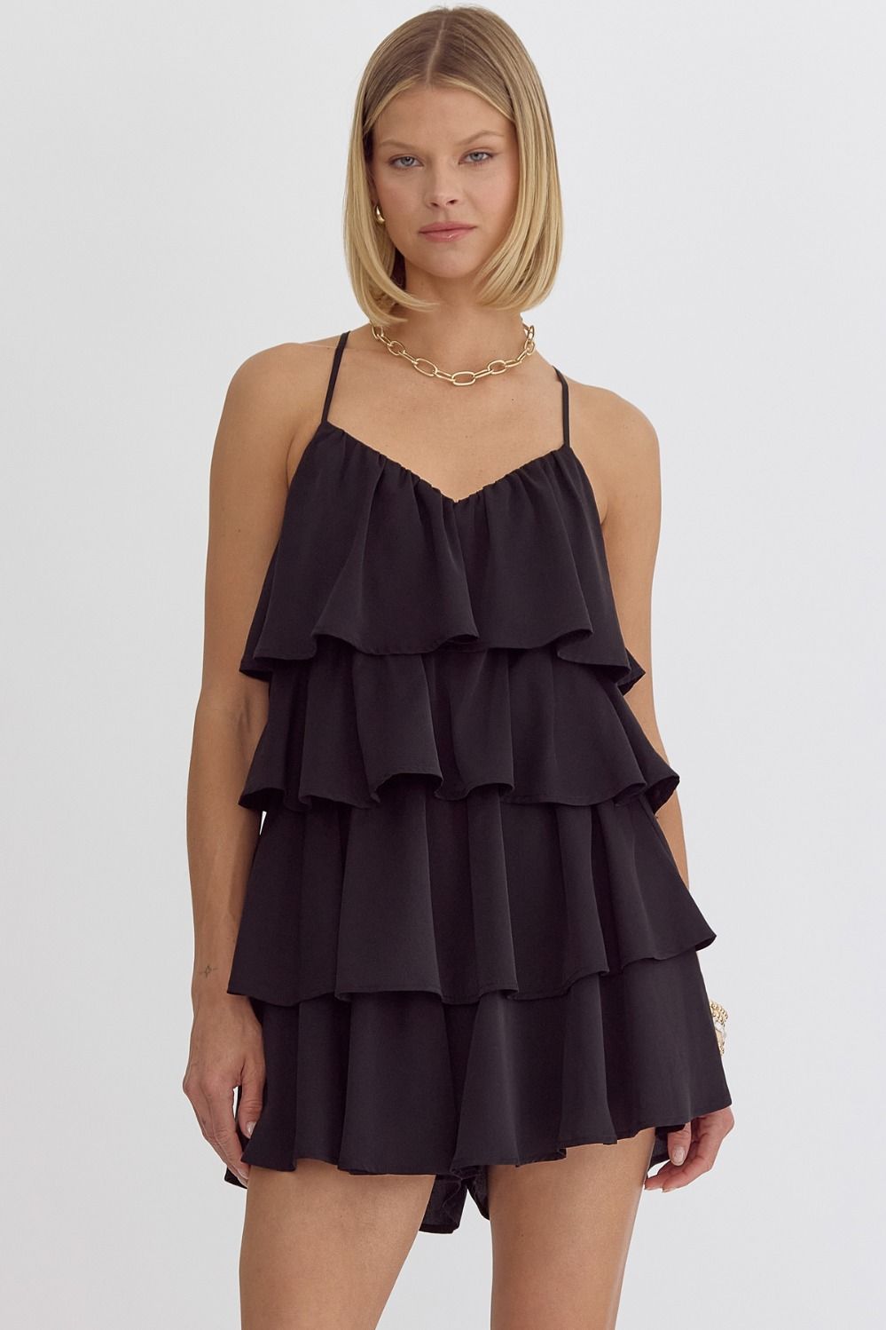 Solid spaghetti strap featuring tiered ruffles