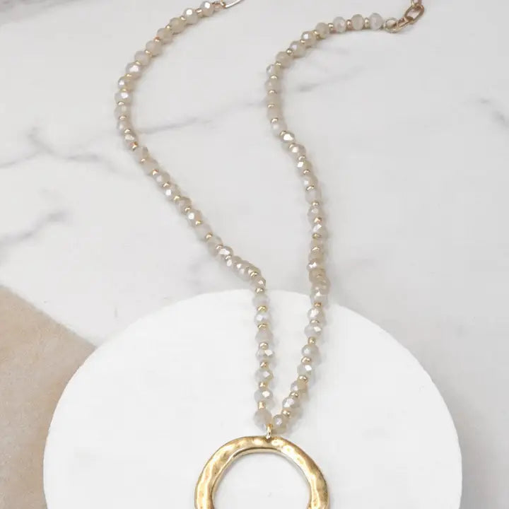 Beaded Necklace with Gold Tone Circle Pendant