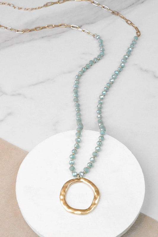 Beaded Necklace with Gold Tone Circle Pendant